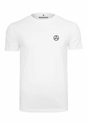 Bela kratka majica s kratkimi rokavi iz bombaža z okroglo ovratnikom. Ima majhen črn okrogel logo na levem prsnem delu.