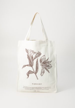 Lerret tote bag med en brun linjetegning av liljer. Vesken er kremfarget med doble skulderstropper og trykt tekst nedenfor.