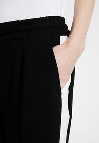 OPUS Trousers - black
