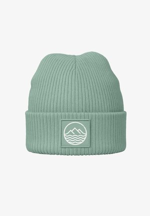 Mint green knit beanie with a ribbed texture and a folded cuff. Features a square patch with white mountain and wave design.