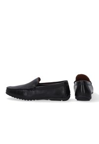 Schwarze Leder Slipper mit abgerundetem Zehenbereich, gesteppten Details und einer strukturierten Gummisohle. Merkmale sind eine glatte Oberfläche und ein einfaches Anziehdesign.
