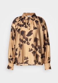 Lichtbruine blouse met donkere abstracte patronen, kraaghals, geplooide schouders en lange mouwen met knoopsluitingen. Gladde textuur.