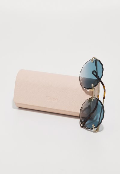 CHLOÉ ROSIE RIMLESS ROUNDED METAL SUNGLASSES - Óculos de sol - gold-coloured/blue