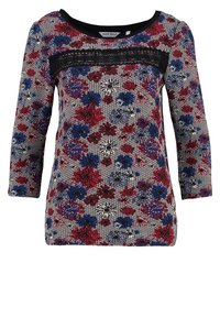 Meer kleurige lange mouwen top met bloemprint. Heeft een zwart kanten accent en een ronde halslijn. Zachte stof met een gestructureerde afwerking.