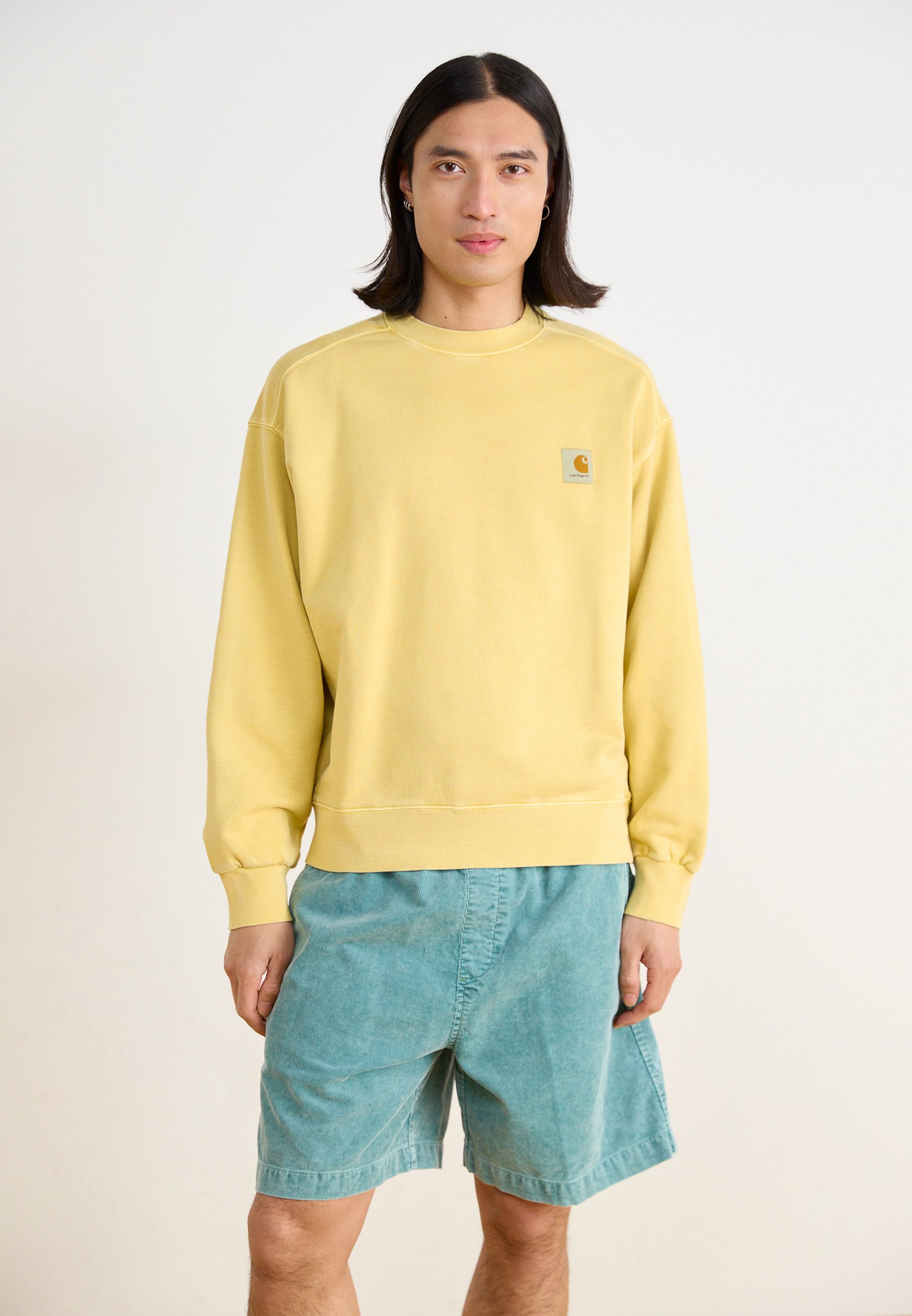 【carhartt】\"Nelson Sweat\"ラベル付き スウェットシャツ/yellow ネルソンスウェットシャツ