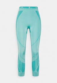 Leggings color aqua con design aderente, texture liscia, e logo Puma sulla vita e sulla gamba inferiore, con sottili variazioni tonali.