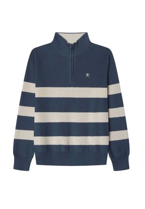 Mørkeblå strikket pullover med halv-zip krave, der har brede cremefarvede striber og et lille logoemblem nær halsudskæringen.