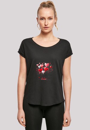 Black short-sleeve T-shirt featuring a colorful heart design at the center, crafted from a soft, lightweight fabric.