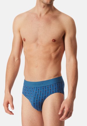 Blaue Herrenunterwäsche mit einem gemusterten Design aus vertikalen Linien in verschiedenen Farben. Weicher Stoff und elastischer Bund mit Branding.