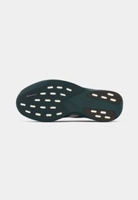 Semelle de chaussure en teal foncé avec des motifs d'accent blancs. Présente une surface texturée et un contour unique. Logo "Continental" visible.