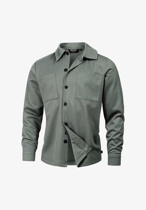 Grøn langærmet skjorte med knaplukning foran, krave, to brystlommer og et let struktureret stof med lige kant.