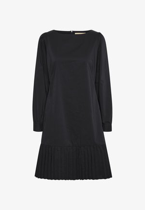 Must karamell, millel on ruudukujuline kaelus, pikad varrukad ja kogutud detailid. Voltitud äär lisab tekstuuri. Valmistatud siledast kangast. Taga on lukk.