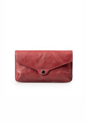 Red leather clutch with a textured surface, featuring an envelope design, a rounded flap, and a black snap closure at the center.