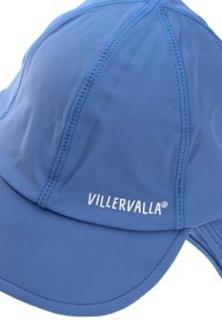 Blue cap made of soft fabric with stitched seams, featuring a curved brim and the logo "VILLERVALLA" embroidered in white.