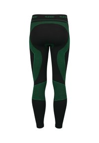 Black leggings with green patterned accents, featuring textured areas and a snug fit. Brand logo displayed on the waistband.