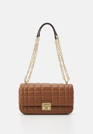 Brown quilted leather handbag with a gold chain strap and clasp, featuring a rectangular shape and smooth texture. Accented with logo detail.