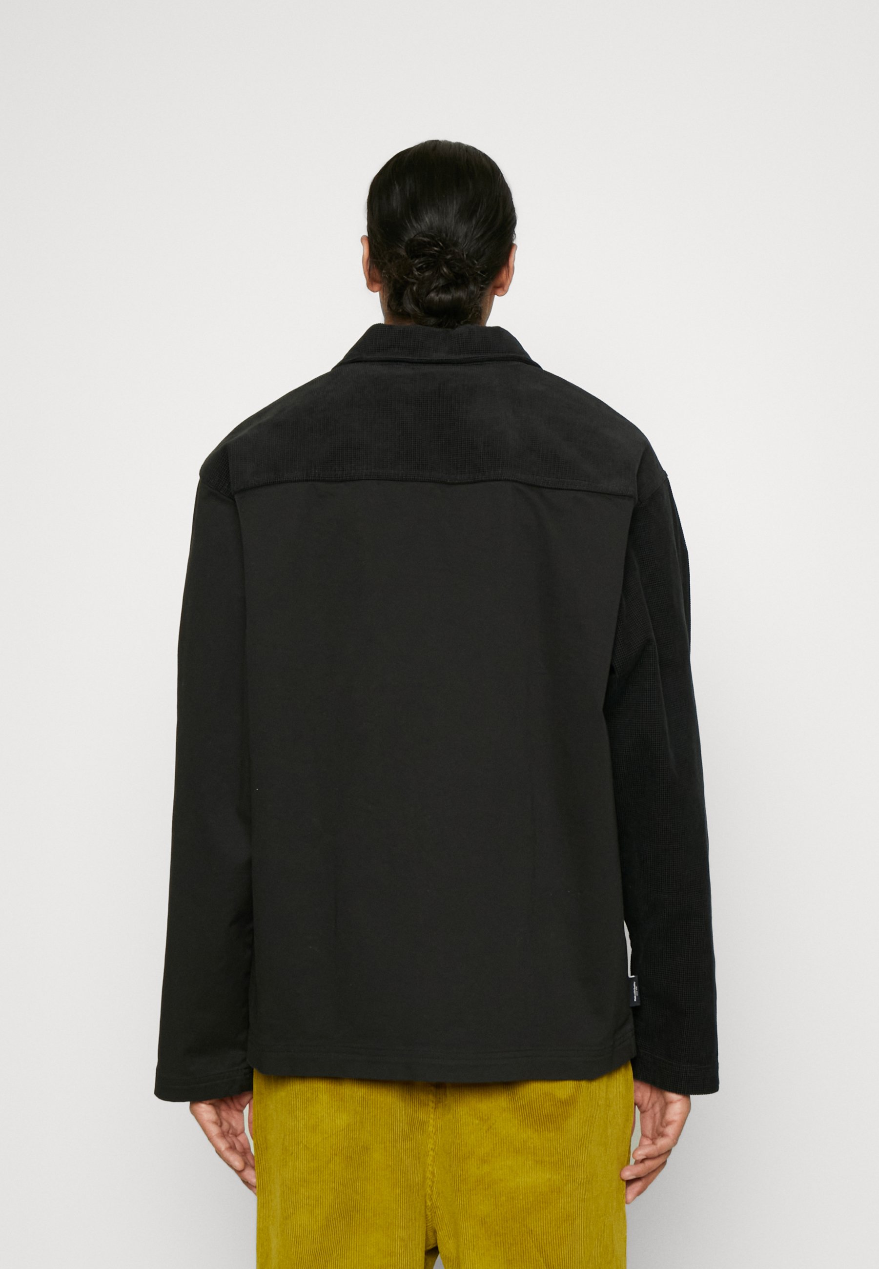 Puma DOWNTOWN - Summer jacket - black - Zalando.co.uk