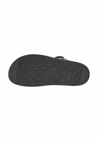 Schwarze Sandalensohle mit strukturiertem Gummioberfläche, die horizontale Rillen und erhabene rechteckige Muster für Grip und Traktion aufweist.