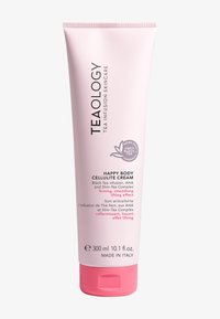Tubetto rosa di Teaology Happy Body Crema Cellulite, con tappo a scatto, con testo nero che dettaglia ingredienti e benefici. Formato da 300 ml.