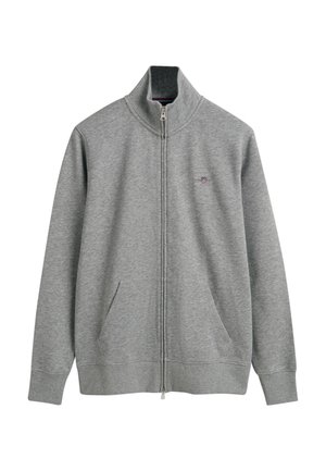 Grå hettejakke med høy krage, sidelommer og ribbestrikkede mansjetter. Laget av mykt materiale med en liten logo brodert på brystet.