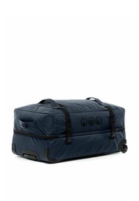 Borsa da viaggio a rotoli in tessuto blu navy con dettagli neri, dotata di due manici superiori, zip e ruote per la mobilità.