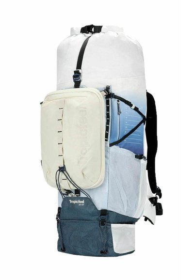 Zaino con parte superiore bianca, design con sfumature di blu, molteplici scomparti, tessuto strutturato, spallacci regolabili e accessori in contrasto.