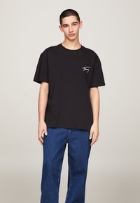 Tommy Jeans SIGNATURE - Basic póló - black