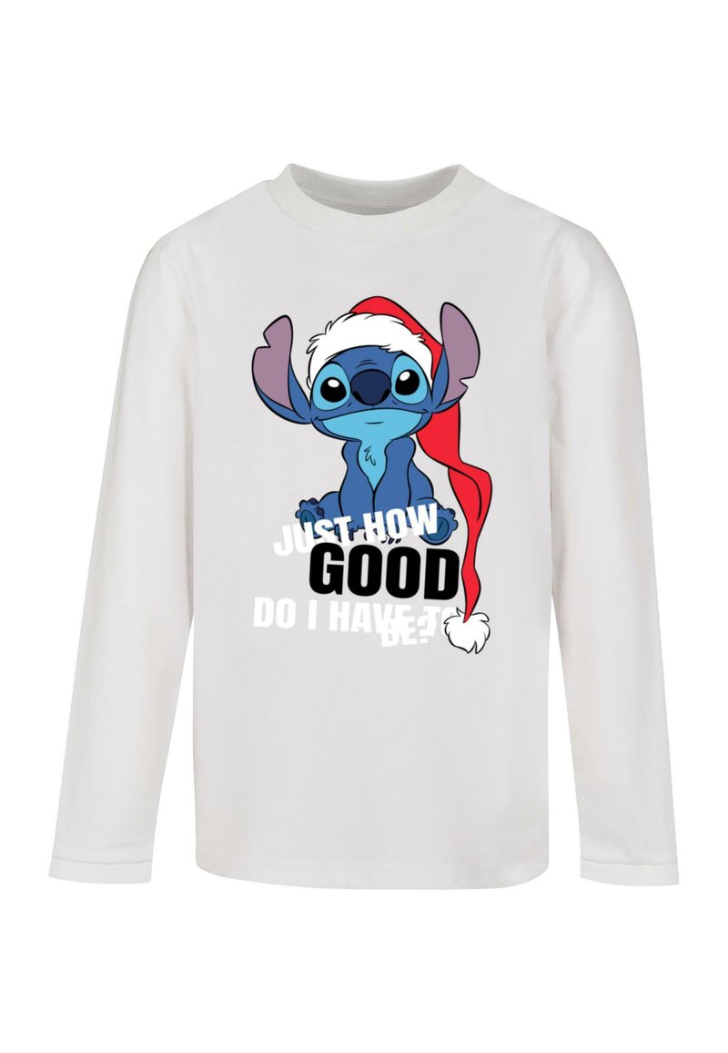 White long-sleeve shirt featuring a blue cartoon character with large ears wearing a red Santa hat and text reading “JUST HOW GOOD DO I HAVE TO BE?”
