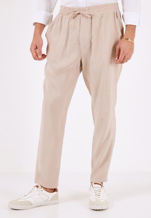 REGULAR FIT - Broek - beige