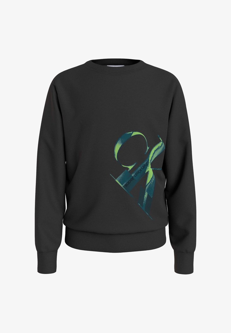 Sweat-shirt noir à col rond avec un grand motif abstrait de ruban bleu et vert et le texte « Calvin Klein Jeans » sur le devant.
