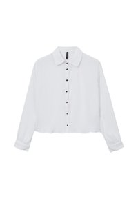 Blusa bianca a maniche lunghe corta con colletto a punta, coste verticali sul davanti e bottoni neri al centro.
