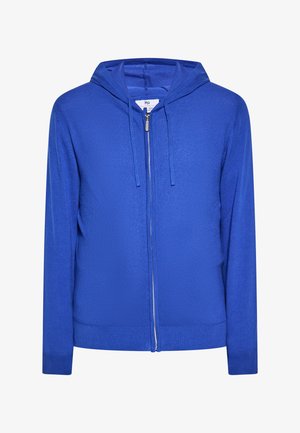 Niebieska bluza z kapturem wykonana z teksturowanej tkaniny, z przednim zamkiem błyskawicznym, kapturem ze sznurkiem oraz ściągaczami przy mankietach i u dołu.