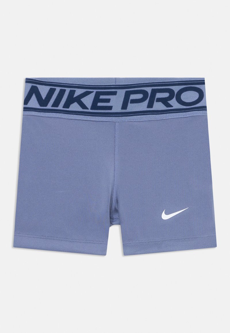 Nike Pro athletic shorts in light blue fabric, featuring a navy elastic waistband with "NIKE PRO" and a small white logo on the front.