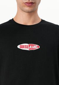 Guess Jeans SMALL LOGO TEE - Marškinėliai su spaudiniu - jet black