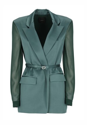 Blazer color petrol con corpo in satin e maniche trasparenti, silhouette aderente, revers appuntiti, vita con cintura e due tasche anteriori. Accentazione in hardware tono argento.