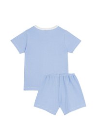 Ανοιχτό μπλε και λευκό ριγέ κοντομάνικο T-shirt με λευκό γιακά, σε συνδυασμό με σορτς με ελαστική μέση που ταιριάζουν. Μαλακό βαμβακερό ύφασμα.