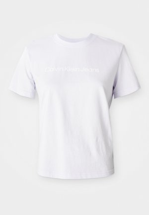 White cotton t-shirt with short sleeves and a crew neckline. Features "Calvin Klein Jeans" logo in subtle white text across the chest.