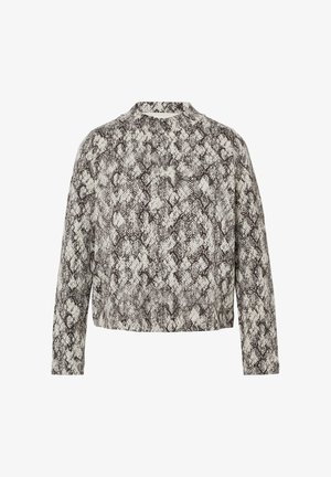 Skórzana bluzka z długim rękawem w fakturowanej tkaninie, z wzorem w czarno-białego węża. Wysoki dekolt i lekko luźny krój.