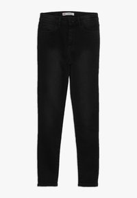Pantalones vaqueros ajustados negros de denim con un diseño clásico de cinco bolsillos, cierre delantero con botón y detalles cosidos a lo largo de las costuras. Tejido elástico.