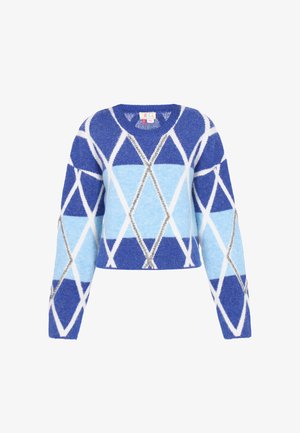 Lühendatud kampsun sinises ja helesinis, mis on kaunistatud kalliskivimustriga valgete ja hõbedaste detailidega. Valmistatud pehmest tekstuuriga kangast.