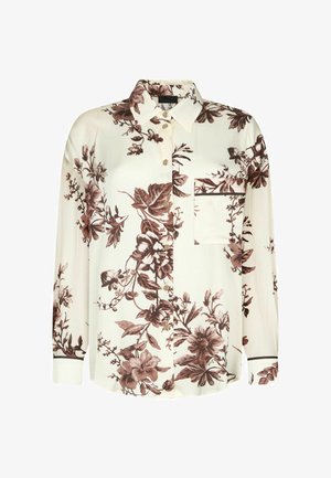 Chemise crème à manches longues avec boutons, imprimé floral marron, col pointu, poche poitrine avec bordure, et poignets à boutons.