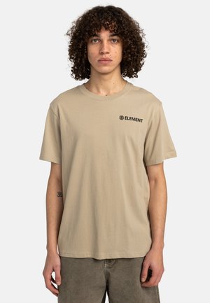 Beige cotton t-shirt with short sleeves, featuring a black "ELEMENT" logo on the chest. Simple design, relaxed fit, classic crew neck.