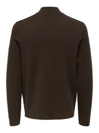 Dark brown knitted sweater with a high collar, long sleeves, and side slits at the hem. Smooth texture, minimal design, no visible patterns.
