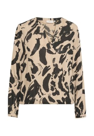 Blouse beige à manches longues avec motif abstrait de coups de pinceau noirs et col en V.