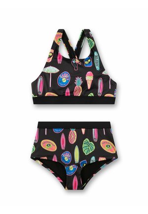 Maillot de bain deux pièces noir avec des imprimés tropicaux colorés incluant des ananas, des planches de surf, des cornets de glace, des feuilles et des motifs de soleil.
