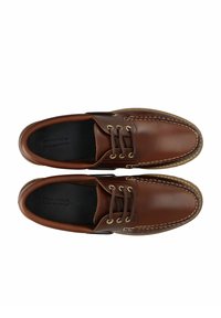 Braune Leder-Schnürschuhe mit gestepptem Design, runder Zehenpartie und goldenen Ösen. Sie haben eine schwarze Innensohle mit "Bianco"-Markierung.