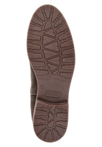 Hnědá gumová podrážka boty s texturovaným vzorem ve tvaru cik-cak. Pevný materiál s zaobleným tvarem a hladkými okraji.