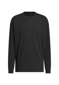 Sort langærmet t-shirt lavet af blødt bomuld, med rund halsudskæring, afslappet pasform og lille logo detaljeret på brystet.