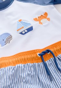 Unselected, blue white stripe