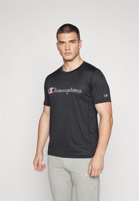 Champion TECH CREWNECK TRAIN LARGE LOGO - Tričko s potlačou - black